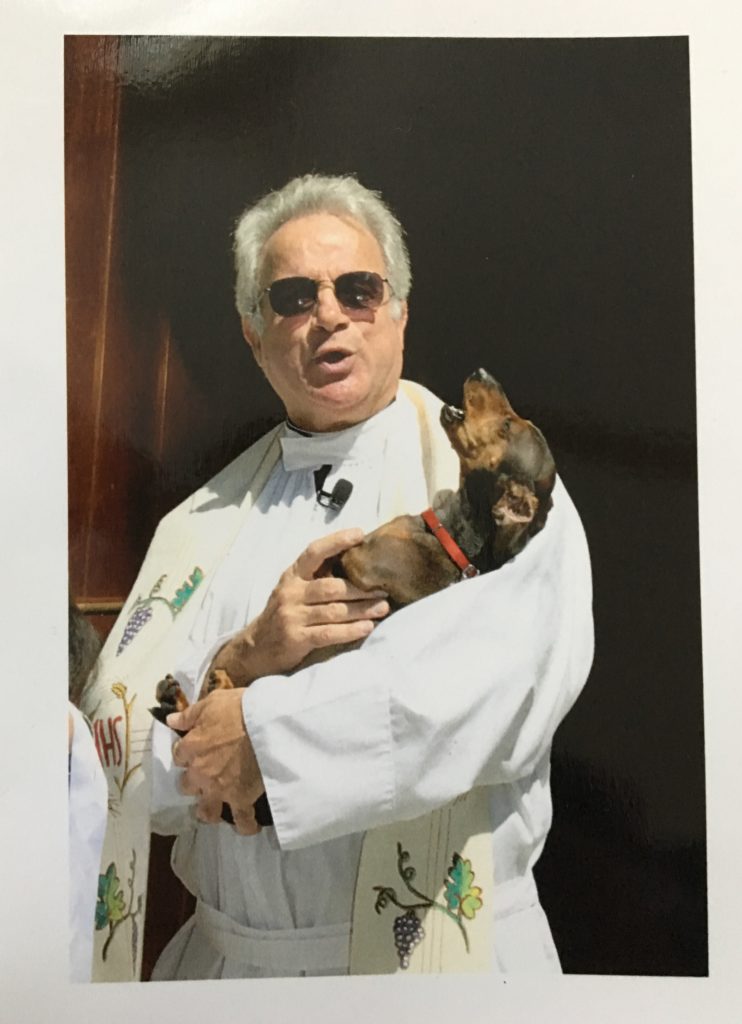 A priest and his dog | Barbara Bell Photography
