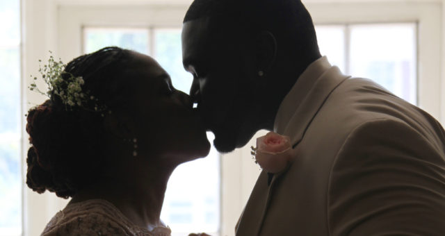 This bride and groom shared a silhouetted kiss on their wedding day | King's Daughters Inn in Durham, NC