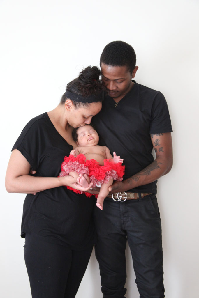 A kiss for a sweet baby during our newborn session in Chapel Hill, NC