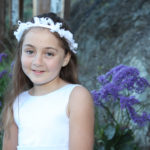 Barbara Bell Photography photographs a girl on her First Communion day. This means that she gets to dress up and feel as special as the day itself.