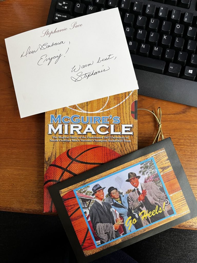 DVD of the documentary with note and Go Heels postcard